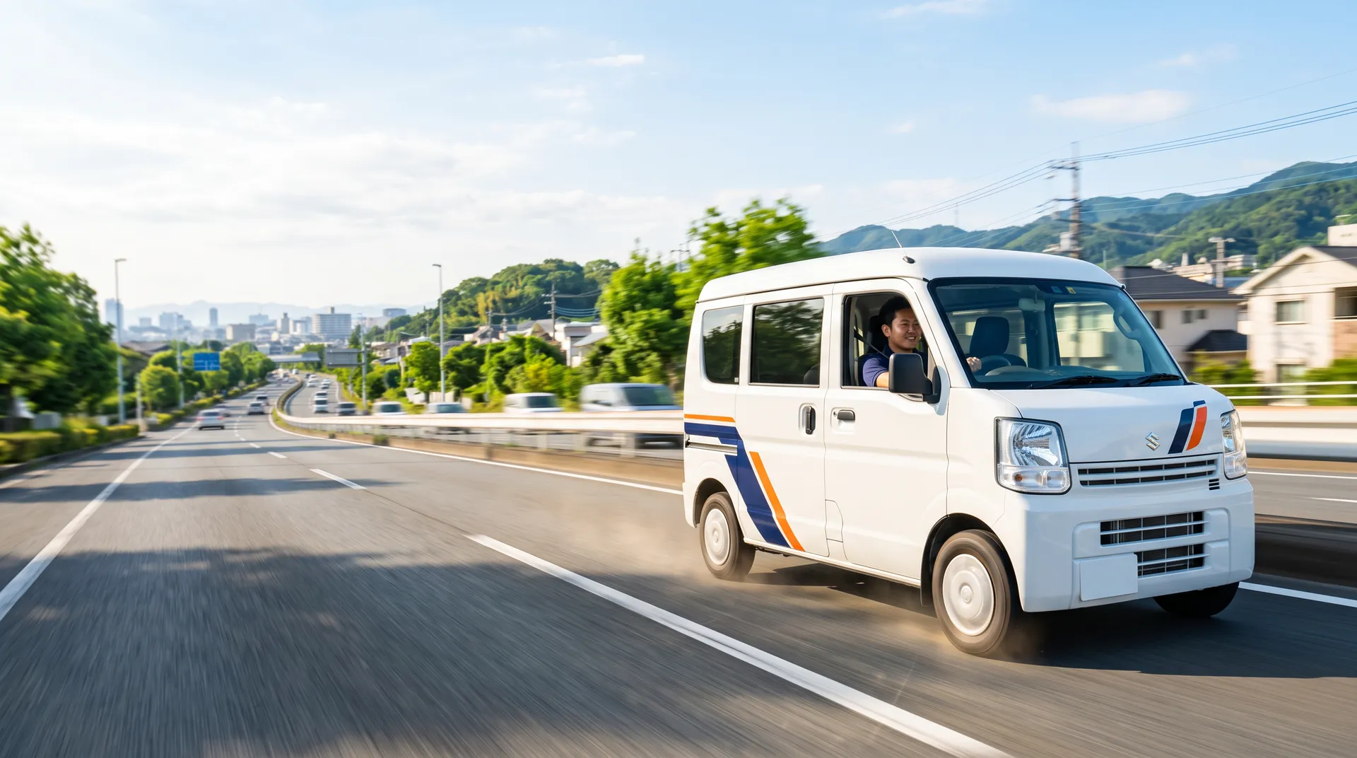 街を走る軽貨物配送車
